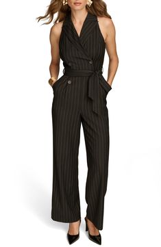 Sleek and sophisticated, this sleeveless striped jumpsuit features a defining belt and a wide-leg silhouette. 31" inseam Front button closure Hidden back-zip closure Unlined 70% polyester, 28% rayon, 2% spandex Dry clean Imported Tuxedo Jumpsuit, Collar Jumpsuit, Coverall Jumpsuit, Silk Jumpsuit, Striped Jumpsuit, Printed Jumpsuit, Sleeveless Jumpsuits, Donna Karan, Black Jumpsuit