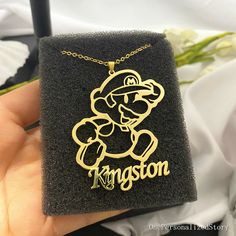 "Mario Necklace-Custom Name Cartoon Character Necklaces-Super Mario Charm Necklace-Childrens Gifts-Personalized Necklace ♥-NECKLACE LENGTH 12in-30cm 14in-35in 16in-40cm 18in-45cm 20in-50cm ♥-CHAIN TYPE LIKE AS PIC ♥-NECKLACE COLOR Gold, Silver, Rose Gold -About shipping and delivery: ♥ All items purchased will be shipped in 7-14business days. ♥ Standard shipping time7-10 working days. (USPS) ♥ Priority shipping 3-5 working days. (FEDX) ✿ WE PROMISE: √ Free Engravings √ Free Gift Box or package ✿ Personalized Novelty Pendant Jewelry, Themed Pendant Necklaces For Gifts, Themed Pendant Necklaces As A Gift, Themed Pendant Necklace As Gift, Themed Pendant Necklace For Gifts, Handmade Gold Jewelry For Father's Day, Novelty Gold Pendant Jewelry, Customized Gold Necklaces For Father's Day, Personalized Novelty Jewelry As Gifts