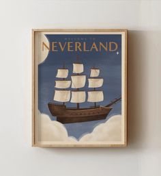 there is a poster on the wall that says neverland with a sailboat flying in the sky