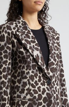 A fierce print powers up an oversized jacket cut with strong shoulders from a cotton-forward blend. One-button closure Peaked lapels Three-button cuffs Chest welt pocket; front welt pockets Back vent Lined 54% cotton, 42% polyester, 4% other fibers Dry clean Made in Canada Chic Printed Fall Blazer, Chic Printed Blazer For Fall, Printed Notch Lapel Blazer For Work, Printed Blazer For Workwear In Fall, Printed Cotton Outerwear For Work, Printed Cotton Workwear Outerwear, Printed Long Sleeve Outerwear For Work, Strong Shoulders, Oversized Jacket