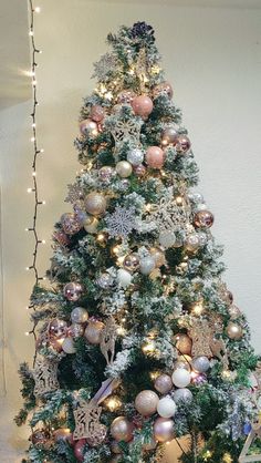 a decorated christmas tree in a living room