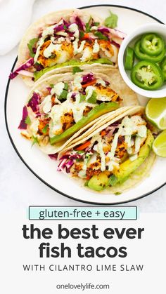 the best ever fish tacos with lime cilantro slaw are ready to be eaten