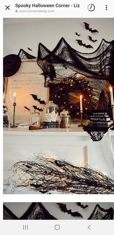 halloween decorations on shelves with candles and bats