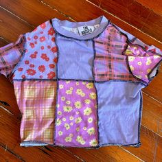 Never Worn Shirt From The Ragged Priest. In Perfect Condition. Pink Fitted Patchwork Top, Fitted Pink Patchwork Top, Pink Patchwork Crew Neck Top, Casual Cotton Tops With Mixed Print, Summer Purple Patchwork Top, Purple Patchwork Short Sleeve Top, Casual Pink Tops With Floral Patchwork, Cotton Short Sleeve Tops With Floral Patchwork, Cotton Tops With Mixed Print