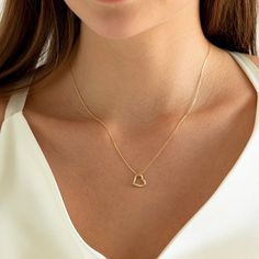 ✥ Embrace love and elegance with our Heart Shape Diamond Moissanite Necklace in 14K Yellow Gold, a stunning piece that captures the essence of romance. This exquisite necklace features a heart-shaped pendant crafted from shimmering diamonds and moissanite stones, set in a warm 14K yellow gold setting. The heart symbolizes love and affection, making this necklace a perfect gift for a loved one or a meaningful addition to your own collection. The pendant hangs gracefully from a delicate yellow gold chain, adding a touch of sophistication to any outfit. Whether worn for a special occasion or as an everyday accessory, this Heart Shape Diamond Moissanite Necklace is sure to be cherished for its beauty and sentiment. ✦ Main Stone Details✧ Shape: Round Moissanite✧ Stone Size Options: 0.14ct✧ No. Gold Diamond Heart Necklace, Heart Shape Necklace, Diamond Heart Necklace, Mens Diamond Wedding Bands, Moissanite Bridal Sets, Moissanite Necklace, Heart Necklace Diamond, Moissanite Earrings, Yellow Gold Setting