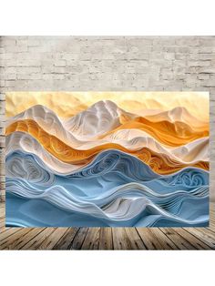 an abstract painting on a brick wall, with waves in blue and orange colors painted on it