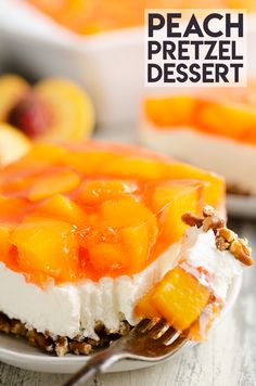 a piece of peach pretzel dessert on a white plate with a fork in it