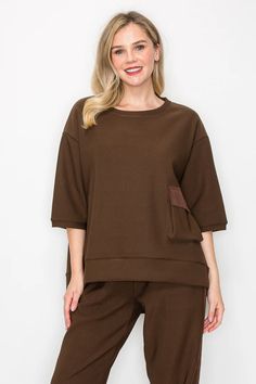 The Karen top. Made with high quality knit crepe. Oversized relax fit. Round neck, elbow length sleeves and front pocket. Perfect everyday wear. Rebecca Robeson, Round Top Collection, Patriotic Fashion, Crepe Top, Elegant Baby, Handbag Charms, Capri Blue, Mackenzie Childs, Jack Black