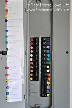 an electrical panel with many different colored buttons