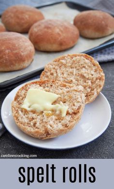 some bread rolls and butter on a plate with the words, speltrolls