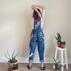 Vintage denim overalls with hand painted red, yellow, and white flowers. Spring Paint Splatter Cotton Jeans, Artsy Cotton Jeans For Spring, Spring Distressed Overalls, Vintage Spring Overalls Jeans, Spring Vintage Overall Jeans, Yellow And White Flowers, Ice Tie Dye, Denim Jumper Dress, Denim Jumper