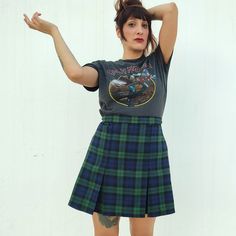 Plaid grunge mini skirt in dark green and navy blue. Tartan preppy high waisted skater skirt. Made to order. All sizes available. Plus sizes are available, just add your natural waist and hips measurements in the note to seller section or send me a message. The skirt is high waist and pleated. Closes with a zipper on the back and it is lined with black lining. The length is 16''(40 cm) It can be made to order at any size, plus sizes are available. Please include your exact waist and hips measure Tartan Skirt Outfit, Grunge Mini Skirt, Dark Green And Navy, Cow Dress, Skirt Preppy, Tartan Mini Skirt, Punk Skirt, Pleated Skirt Outfit, Skirt With Pleats