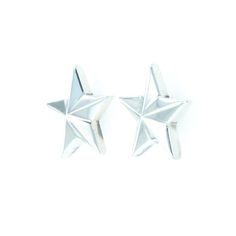 .925 Sterling Silver Height: 11mm Width: 11mm Depth: 5mm 14k white gold posts Made in USA Classic Silver Star-shaped Jewelry, Silver Star-shaped Formal Jewelry, Silver Star-shaped Jewelry For Formal Occasions, Silver Star-shaped Jewelry For Formal Events, White Star-shaped Formal Jewelry, Sterling Silver Star Earrings In White Gold, White Gold Star-shaped Sterling Silver Earrings, Star-shaped White Earrings For Anniversary, White Gold Star Earrings For Formal Occasions