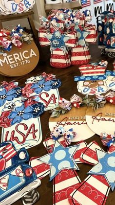 patriotic themed cookies are laid out on the table to be served at an american party