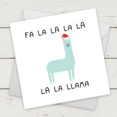 a greeting card with an image of a llama wearing a santa's hat