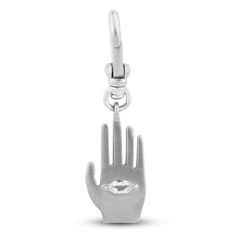 Designed to represent an open palm symbolizing greeting and protection, this antique-finished 10K white gold hand is held up in a gesture of universal peace, knowledge and security. Centered in the palm is a marquise-shaped white sapphire "eye;" representing a seeing force that keeps us safe and protected. A classic symbol from many cultures, our version of the Hamsa is designed with the intention of helping you find your own unique creative abilities and inner sense of peace. 10K white gold 4mm Open Palm, Sapphire Eyes, Lulu Frost, Jared The Galleria Of Jewelry, Gold Hand, Gold Hands, The Palm, Antique Finish, White Sapphire