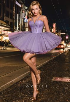 This A-Line Tulle Short Homecoming Dress features a sweetheart neckline and sleeveless design that is both elegant and romantic. Made with high-quality tulle, it boasts a flattering A-line silhouette that complements every body type. Perfect for any special occasion, this dress is a must-have for a timeless and sophisticated look. Elegant Tulle Corset Dress For Homecoming, Sleeveless Tutu Dress With Fitted Bodice For Wedding, Lavender Tulle Dress With Fitted Bodice, Fitted Bodice Tulle Tutu Dress For Prom, Lavender Tulle Dress With Sweetheart Neckline, Spring Ball Gown With Sweetheart Neckline, Tulle Tutu Dress With Fitted Bodice For Prom, Party Ball Gown With Sweetheart Neckline And Tulle Skirt, Elegant Sleeveless Purple Tutu Dress