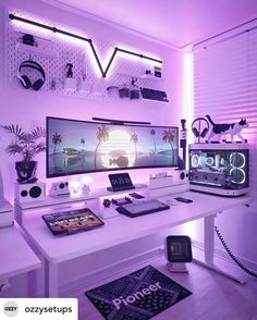 a white desk topped with a computer monitor and keyboard