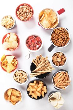 an assortment of snacks in bowls with the words back to school endmetios on top