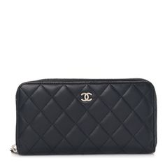 This is an authentic CHANEL Lambskin Quilted Large Gusset Zip Around Wallet in Black. This chic clutch wallet is crafted of diamond quilted lambskin leather with a small Chanel CC logo in silver. The silver zipper opens to a partitioned burgundy leather interior with two card slot panels and a zipper compartment. Chanel Zipper Wallet, Designer Quilted Rectangular Wallet, Elegant Quilted Wallet For Formal Occasions, Elegant Quilted Wallets For Formal Occasions, Elegant Quilted Rectangular Wallet, Designer Leather Wallet With Quilted Detail, Classic Quilted Wallet For Everyday Use, Designer Quilted Leather Wallet, Classic Quilted Wallet