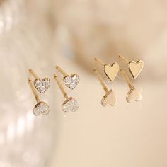 Our Minnie Heart Studs are the perfect classic jewelry accessory. Make these charming earrings your new go-to pair or gift to someone you hold dear. Product Details: Material: 14K Solid Gold Thickness: 0.8mm Size: 4.2mm×3.6mm Sold as a pair Delicate Heart Earrings For Anniversary, Dainty 14k White Gold Heart Earrings, Yellow Gold Heart Earrings For Anniversary, Dainty Double Heart Rose Gold Earrings, Elegant Tiny Heart Shaped Earrings, Tiny Elegant Heart-shaped Earrings, Elegant Small Yellow Gold Heart Earrings, Elegant Tiny Earrings For Valentine's Day, Elegant Earrings For Valentine's Day