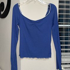 Dark Blue Long Sleeve Ribbed Top In A Size Small. Has White Detailing By Neckline And Hem. In Brand New Condition. Casual Blue Ribbed Top, Blue Long Sleeve Ribbed Top, Blue Ribbed Long Sleeve Top, Spring Blue Ribbed Tops, Blue Stretch Tops For Day Out, Women Work Blouse, High Neck Tank Top, Printed Sleeveless Top, Long Sleeve Plaid Shirt