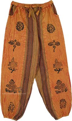 A boho chic yoga pants with block print on light orange cream on the sides and striped inners - with pockets, flexible drawstring, elastic waistband, and elastic ankle cuffs.  The cotton pants have floral and spiritual symbol stamps printed on them that look very unique. #tlb #SplitSkirtsPants #Stonewash #bohemianfashion #HaremPants #BlockPrint #bohojoggerpants #cottonjogger Orange Clothing, Boho Lounge, Bohemian Pants, Hippie Look, Trendy Skirts, Split Skirt, Boho Chic Style, Orange Cream, Ankle Cuffs