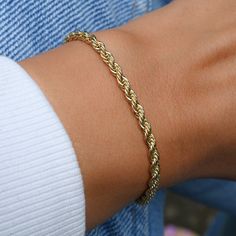 "This rope chain bracelet is super cute and trendy! It makes a statement on its own, or paired with other bracelets for that chic layered look! - - - D E T A I L S - - - * 14k Gold plated over Brass * We use a THICK plating of 14k Gold * Lobster Clasp Closure * 6.75\" + .5\" Extension * 3mm thick * Nickel-free and Hypoallergenic Matching Necklace available! https://www.etsy.com/listing/889269128/layering-necklaces-layered-necklace?ga_search_query=rope%2Bchain&ref=shop_items_search_1&pro= Luxury Gold Bracelet With Rope Chain For Gift, Luxury Satellite Chain Bracelet Gift, Cheap Gold Braided Bracelet With Beads, Luxury Gold Bracelet With Rope Chain As Gift, Luxury Gold Braided Bracelets For Women, Luxury Gold Rope Chain Bracelet As Gift, Luxury Rope Chain Bracelet As Gift, Luxury Gold Bracelet Rope Chain Gift, Luxury Rope Chain Bracelet For Gift