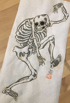 a drawing of a skeleton on a piece of paper