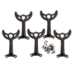 four black metal brackets with screws and nuts