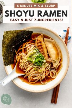 a bowl filled with noodles and meat next to chopsticks on top of a table