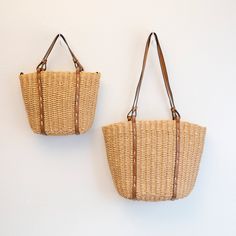 IN STOCK. SHIPPING FROM LOS ANGELES. FAST PROCESSING. Chic simple straw woven tote bag perfect for all occasions. It makes a great accessory for a day of errands or a night out, adding a touch of beachside glamour to any ensemble. Two size available Zipper Closure Small size approximately: 9"H x 12"W x 4"D; handle drop: 5 inches; comes with adjustable crossbody strap Medium size approximately: 11"H x 15"W x 6"D; handle drop: 12 inches; Fully lined Designer Style ID: 8689 Chic Straw Woven Tote Bag, Vintage Vibes, Summer Bag, Everyday Shoulder Bag, Beach Bag Everyday Shoulder Bag, Woven Tote Bag, Raffia Bag, Straw Bags, Summer Bag, Denim Bag, Bag Vintage, Designer Style, Knitted Bags