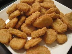 some fried food is on a white plate