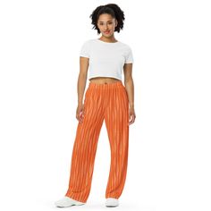 Women's pants. Get the comfort of pajamas in this stylish pair of wide-leg pants. With the adjustable waist and stretchy fabric, it's like your favorite sweatpants but better. * Relaxed unisex fit * Practical side pockets * Elastic waistband with a white drawstring * Can be worn on the waist or on the hips * Premium knit mid-weight jersey fabric * 95% polyester, 5% elastane (fabric composition may vary by 1%) * Fabric weight: 6.19 oz/yd2 (210 g/m2) (weight may vary by 5%) Womens Wide Leg Pants, Striped Wide Leg Pants, Womens Fashion Casual, Color Trends, Jersey Fabric, Leg Pants, Wide Leg Pants, Pajamas, Girl Outfits