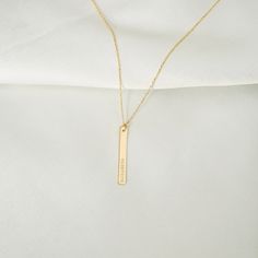 "Get her the 14k gold bar name necklace and let her know you would go the extra mile for her. It is perfect for engraving and is available in yellow or rose gold, or white gold. D E T A I L S * 100% 14k Solid Gold * Choice of Gold Color: Yellow Gold, Rose Gold, White Gold * Pendant Height: 25 mm/1 inch * Pendant Width: 4 mm/0.15 inch * Length: 14\", 16\", 18\", 20\", 22\" (Got a little note that can help you in the photos.) * Ready to Ship in 1-3 Business Days * 100% US sourced Got something you Minimalist Engraved Yellow Gold Bar Necklace, Minimalist 14k Gold Nameplate Necklace, Dainty 14k Gold Bar Necklace Gift, Minimalist Gold Engraved Bar Necklace, Minimalist Engraved Gold Bar Necklace, Personalized Gold Bar Necklace For Everyday, Minimalist Jewelry With Engraved Text For Everyday Use, Everyday Personalized Gold Bar Necklace, Minimalist Rectangular Pendant Necklace With Engraved Text