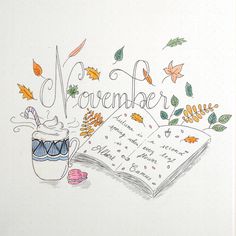 an open book with writing on it next to a cup and leaves that say november