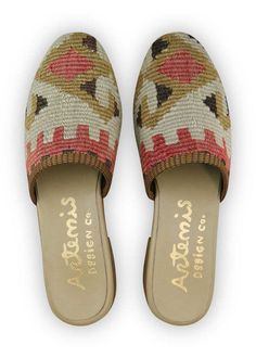 The Artemis Women's Slides feature a captivating color combination of brown, red, white, khaki, and black. These slides offer a striking blend of warm and neutral tones, creating a versatile and stylish look. Whether you're lounging at home or stepping out for a casual occasion, these slides are the perfect choice.  (Front View) Casual Closed Toe Mules With Woven Sole, Casual Closed Toe Mules With Textured Sole, Casual Mules With Removable Insole, Summer Pointed Toe Clogs With Removable Insole, Casual Mules With Woven Sole And Flat Heel, Classic Flat Clogs With Removable Insole, Summer Pointed Toe Clogs With Leather Sole, Casual Clogs With Pointed Toe And Leather Sole, Casual Mules With Woven Sole