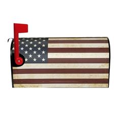 an american flag mailbox with a red post on the front and bottom, is shown