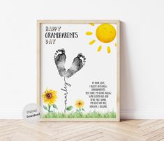 a happy grandparents day card with sunflowers and footprints