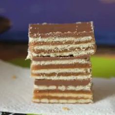 three pieces of cake are stacked on top of each other