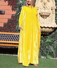 Featuring an Sunny Bright Yellow One piece Kaftan with handcrafted as and wherever is required of zardosi, cutdana, resham, sequins,dabka embroidery, floral butti & scallop motif embellishment & gota work.  For collection visit --  https://www.indberry.com This product will be shipped to you after 1-2 weeks from the date of order placed. All custom made orders are not returnable. Pls contact for Size chart and for other more colors Request You :To provide contact details for courier services. {VARIATION MAY COME ,IF ANY LACES OR GOTTA PATI or TUSSELS IS USED } NOTE:  1) Visual Samples on website may differ slightly from actual product due to light & effects during photography (Length & Breadth have 1 n 1.5 inches +/-). 2) Before placing order ,pls confirm product n color availability and Dabka Embroidery, Yellow One Piece, Gota Work, Embroidery Floral, Light Effect, Bright Yellow, Color Patterns, Sunnies, Custom Made