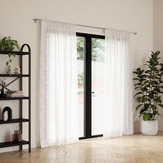 a living room filled with furniture and a window covered in white drapes next to a potted plant