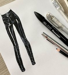 a drawing of a woman's legs and leg in black leather pants with high heels