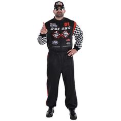 a man in a racing suit is giving the peace sign while standing with his hands on his hips