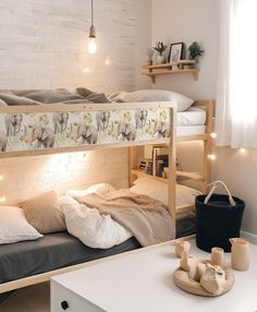 there is a bunk bed with lights on the top and bottom, along with other items