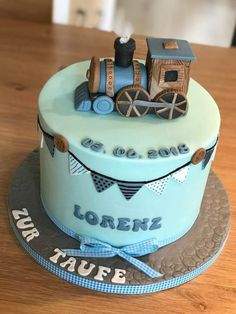 a birthday cake with a train on top