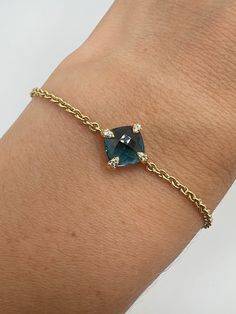 18K Yellow Gold Diamond 0.06ct Blue Topaz Chain Bracelet 6.5 to 7.5 inch A perfect gift for your little loved one for any special occasion or holiday!  Total Bracelet Weight: 4.35g Bracelet Length: 6.5 to 7.5 inches  Bracelet Width: 11.37mm Bracelet closure: Lobster Claws  Item will be placed in a Gift Box. * Elegant Blue Jewelry For Birthday Gift, Sapphire Round Diamond Bracelet Gift, Blue Birthstone Bracelets In Fine Jewelry Style, Blue Birthstone Bracelets Fine Jewelry, Fine Jewelry Blue Diamond Cut Bracelets, Fine Jewelry Blue Diamond Cut Bracelet, Fine Blue Diamond Cut Bracelet, Blue Gemstone Jewelry For Birthday Gift, Sapphire Bracelets With Diamond Accents As Gift