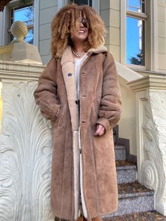 Super long sheepskin woman coat. Rare find.  Heavy and  warm. In very good vintage condition. It has a very slight dirt on the bottom visible in the photos, but overall looks really good as a vintage item, just typical for vintage and nothing that disturbs the overall look Features:   Geniune shearling  Two side pockets  Button up closure Buttons on the left hand side Fully lined with wool Puffy sleeves  No size labeled.  This piece is in approx size L to XL Model in the photo is an EU size 36/38 and is 162cm high and it's oversized on her. Please check measurements before buying. Armpit to armpit 60cm Waist 65cm Hips 69cm Sleeve length by armpit 42cm Sleeve by collar 81cm Coat lenght 120cm Width at the bottom 75cm Text me for any questions. Please read my store policy before making a purc Brown Full-length Outerwear For Fall, Brown Long Fur Coat For Fall, Brown Long Fur Coat For Winter, Brown Full-length Winter Outerwear, Woman Coat, Sheepskin Jacket, Puffy Sleeves, Long Coat, Left Hand