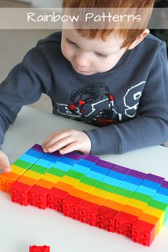 a young boy playing with legos on the table in front of him and text overlay reading rainbow patterns