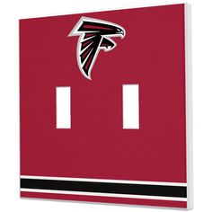 the atlanta football team light switch plate cover is red and black with an nfl logo on it